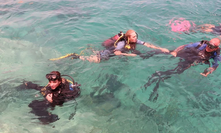 “Dive instructor guiding beginners at Coral Beach, Varadero”
