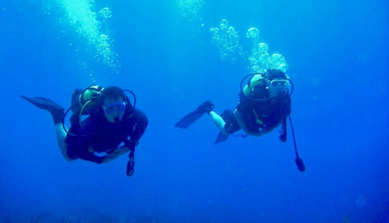 Student hovering underwater during certification training