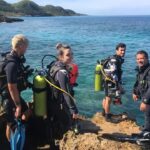 Open Water Diver students entering the Caribbean Sea in Varadero,