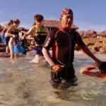 Family snorkeling together in the clear waters of Varadero