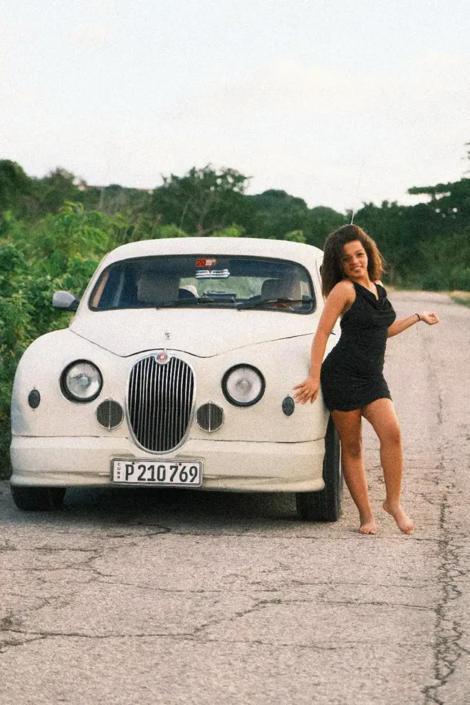 Private transfer vehicle traveling between destinations in Cuba