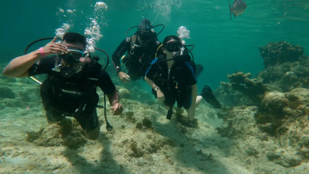 Beginner scuba diver exploring Playa Coral near Varadero Cuba